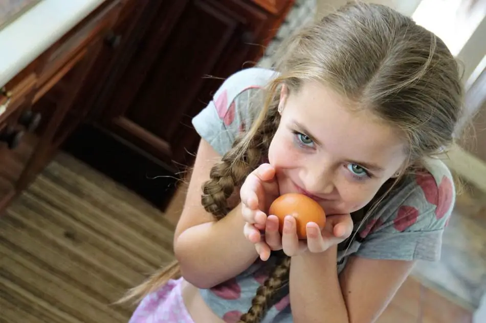 girl with fresh egg